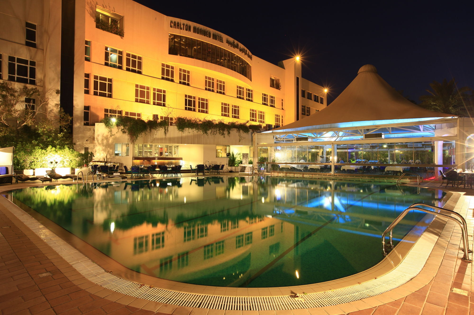 Carlton Al Moaibed Hotel Dammam Dış mekan fotoğraf The swimming pool at the hotel